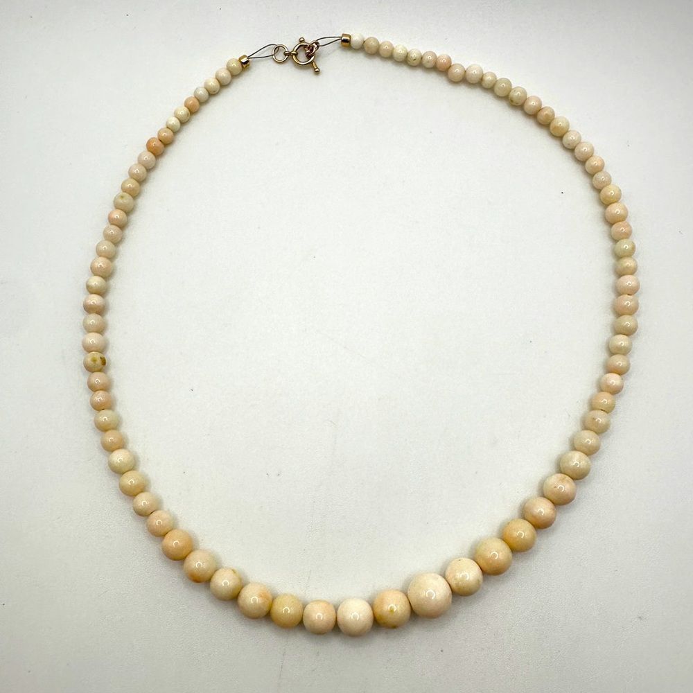 18" Graduated Angel Skin Coral beaded necklace w/ 14kt yellow gold toggle clasp!